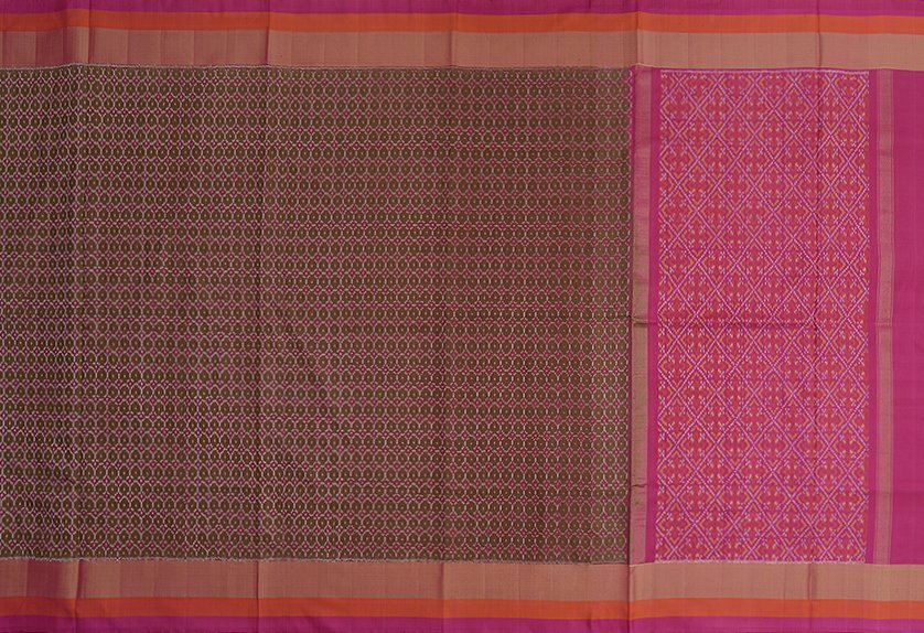This handwoven Rajkot Patola saree features small, tightly-packed abstract motifs and is a single ikat weave.